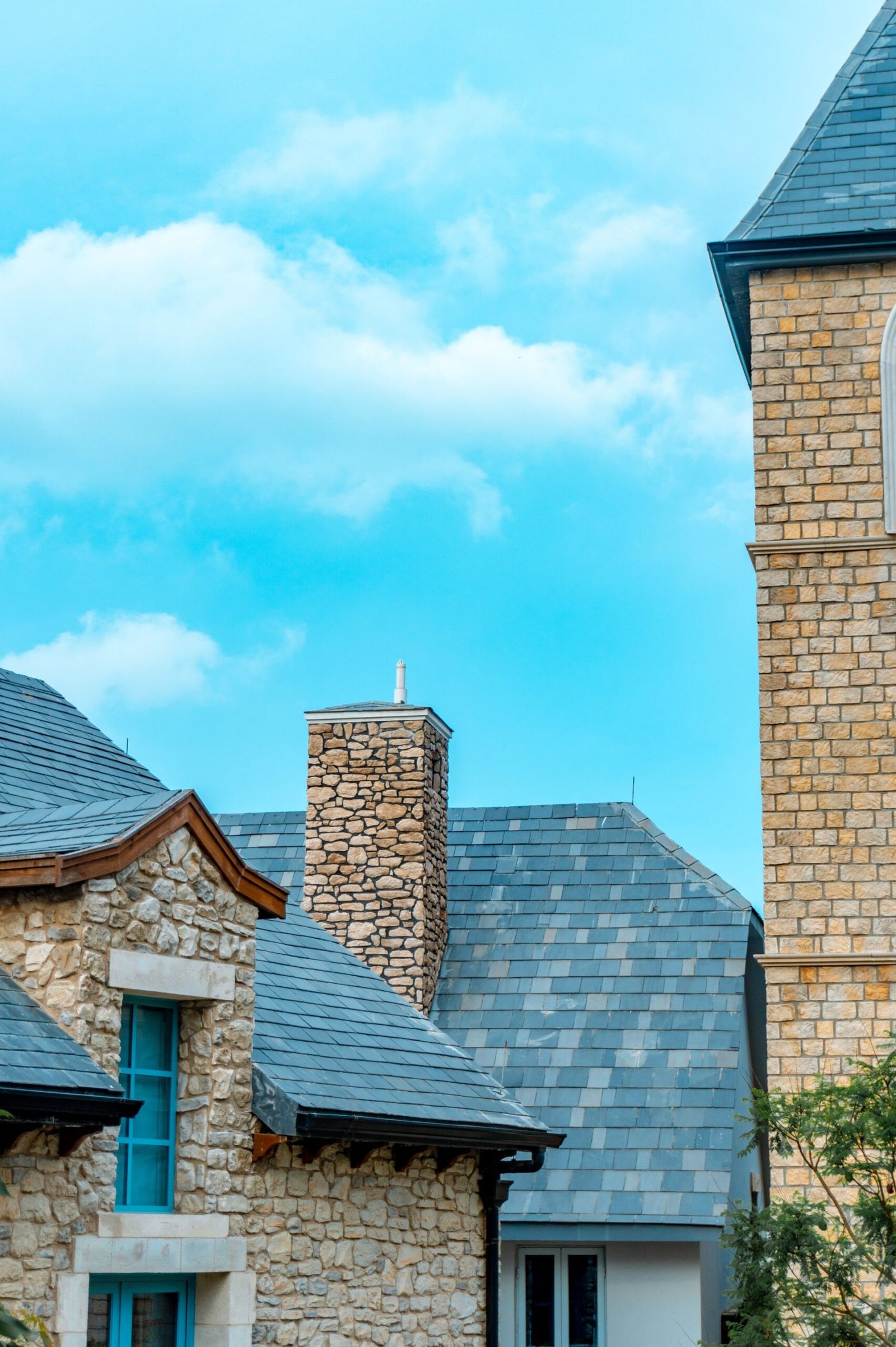 Slate roofs and chimneys on older stone buildings
